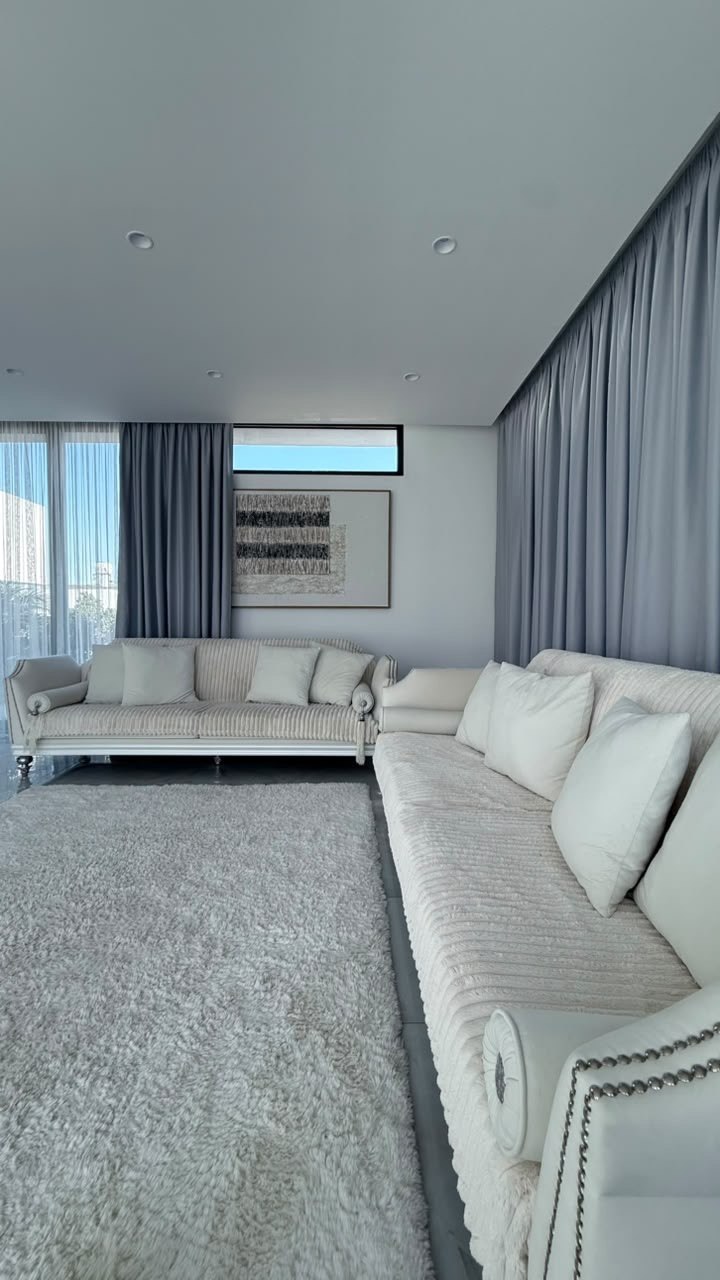 Living room with floor-to-ceiling windows
